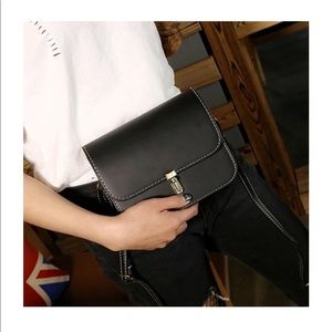 Small black leather bag